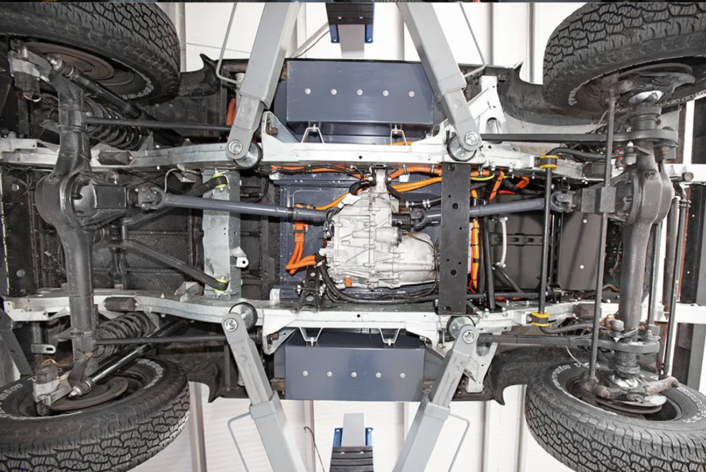 mid engine tesla model 3 installation land rover defender